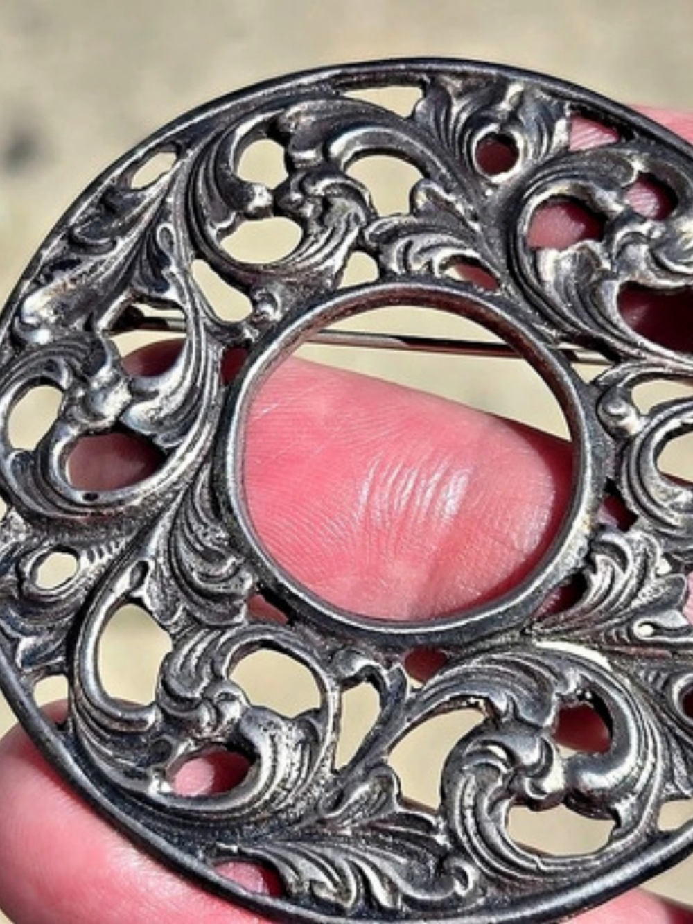 Vtg. Tinn, Norway signed silver 925 round open work leaf swirl brooch.